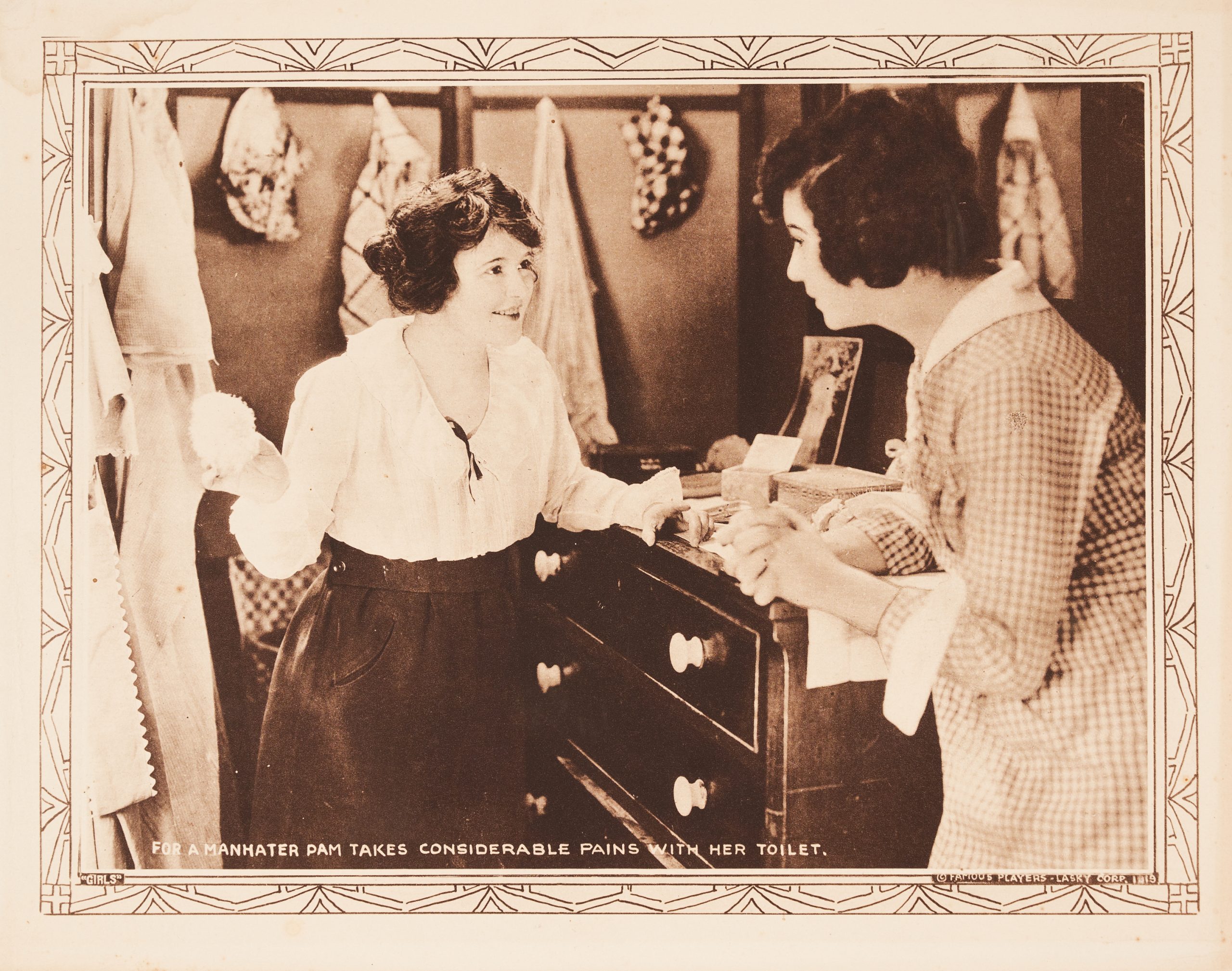 A lobby card showing two women having a conversation in a boudoir.