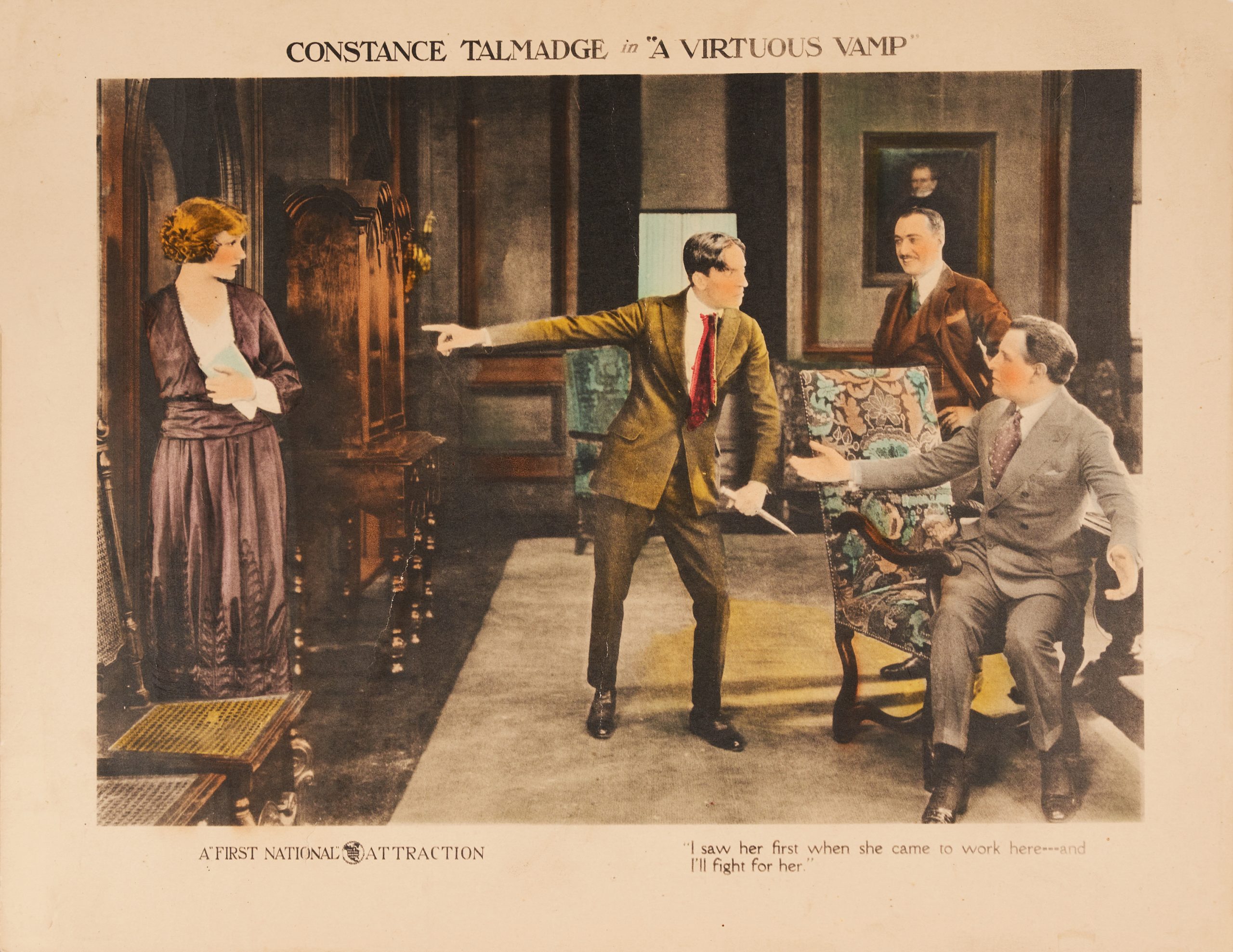 A colored-in lobby card showing two men in an office arguing over the woman standing in the doorway.