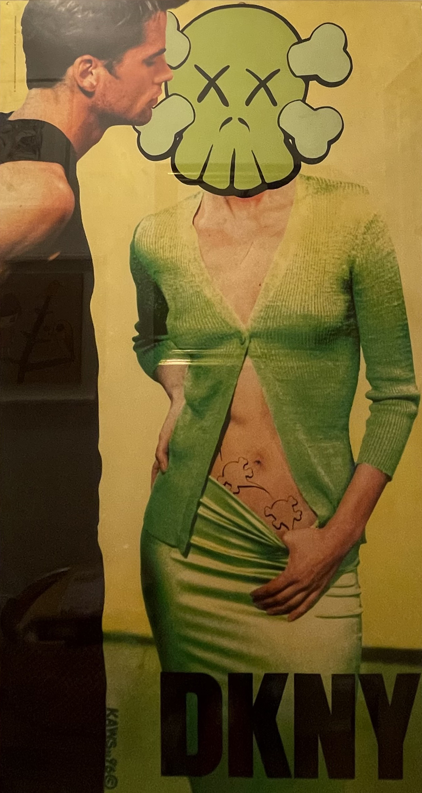 A photo-offset poster of a model with a skull head standing next to another model.