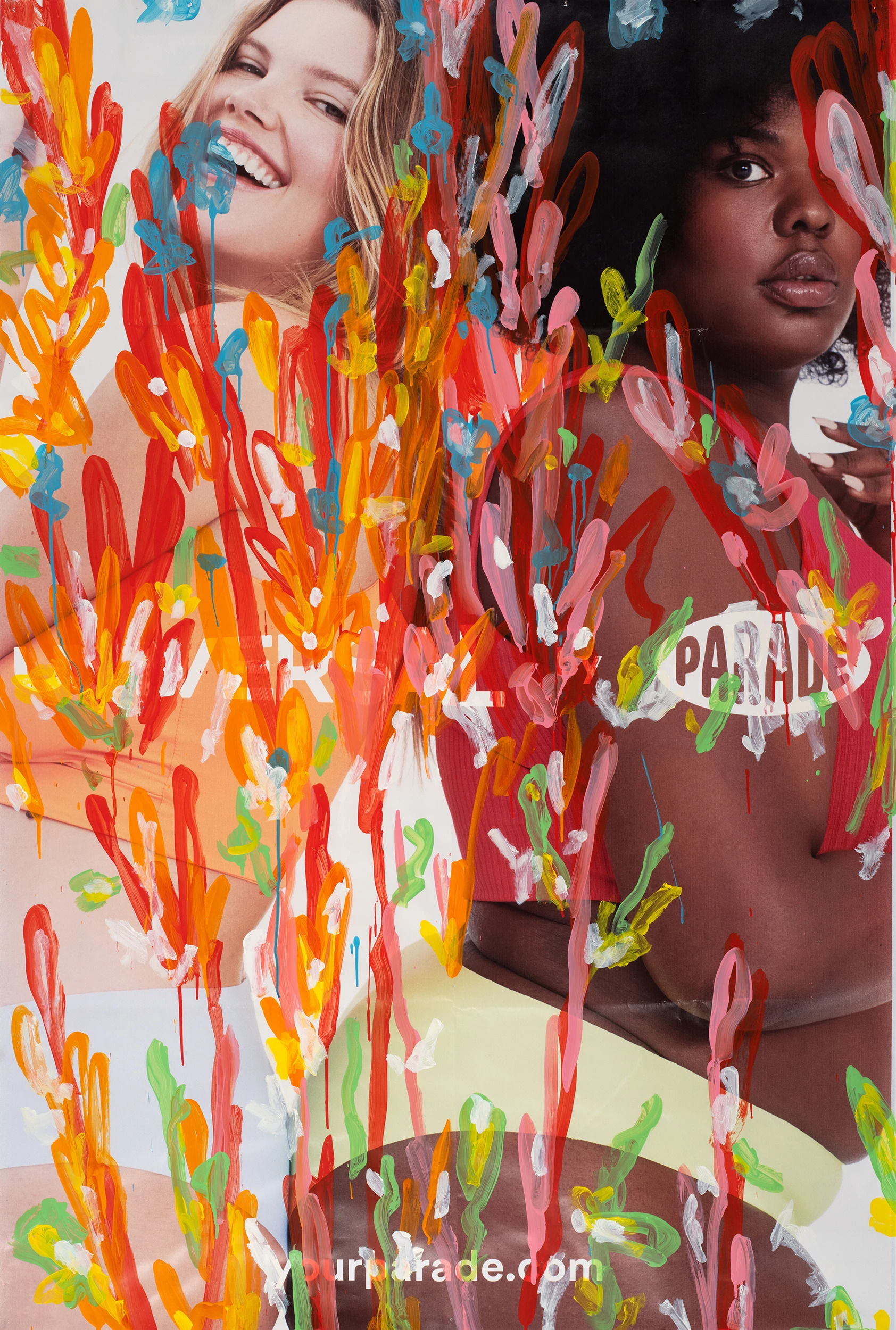 A photo-offset poster of 2 models advertising underwear, obscured by painted multicolor lines.