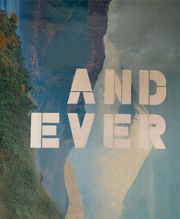 A photo-offset poster depicting text overlaying a mountain and greenery landscape.