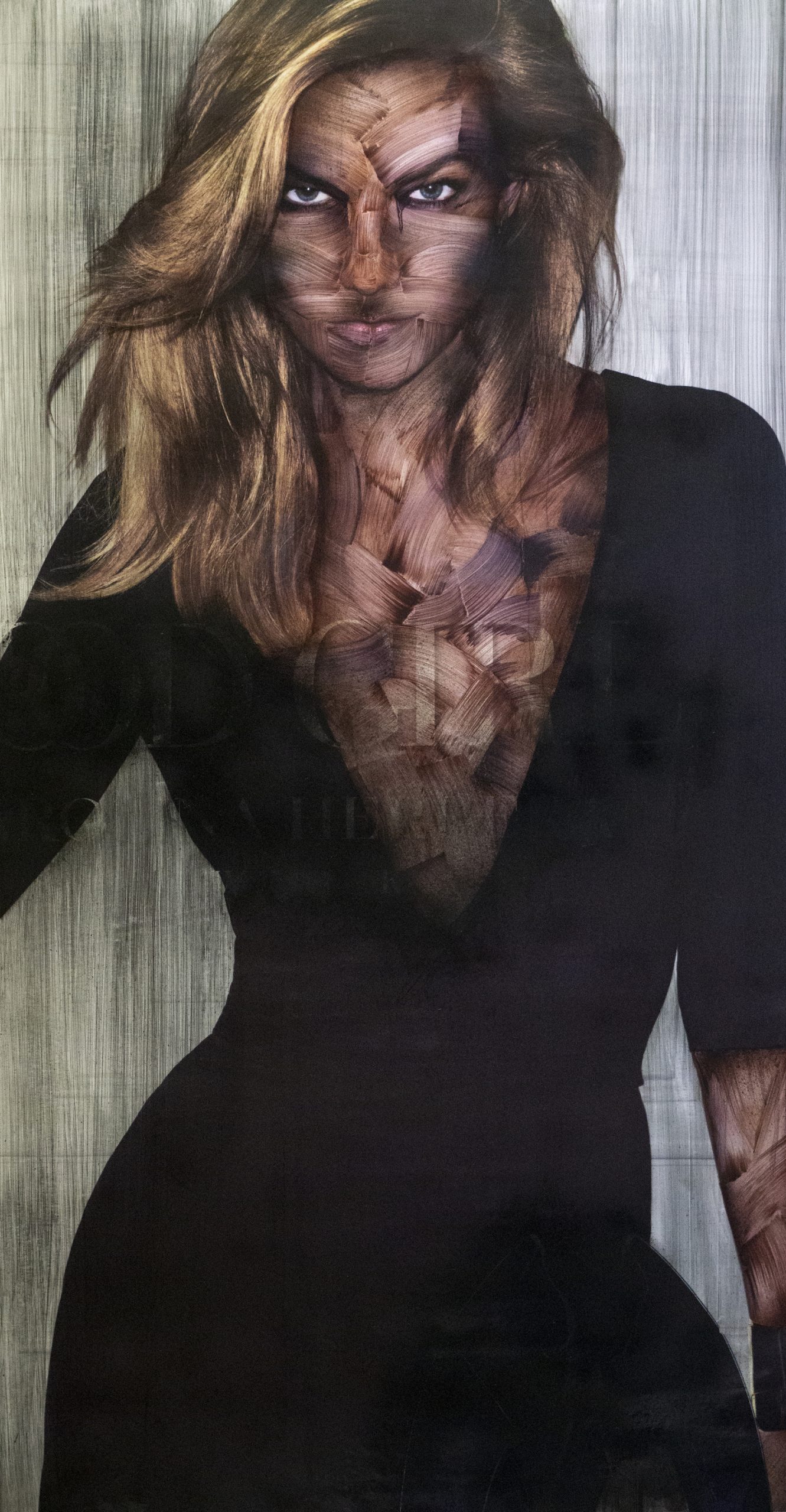 A mixed-media poster of a model with brushstrokes covering it.