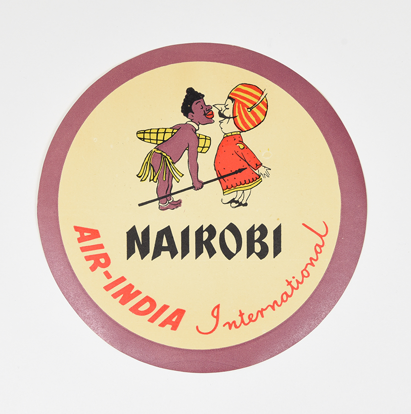 A coaster of a mustachioed figure wearing a turban almost kissing a person from Nairobi.