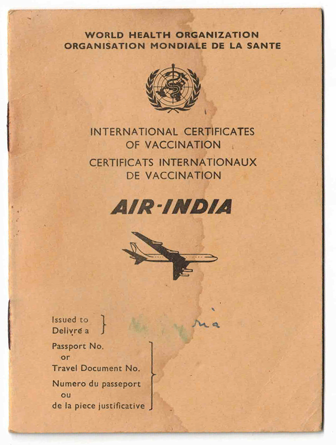A brown booklet of vaccination certificates with an airplane and a World Health Organization logo.