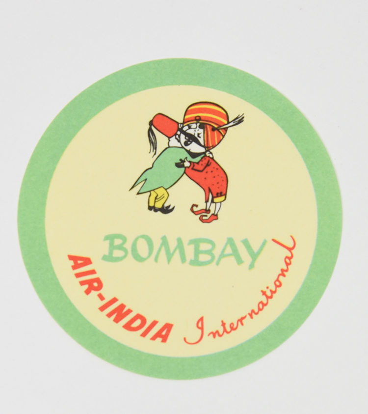 A coaster of a mustachiod figure wearing a turban hugging a person from Bombay.