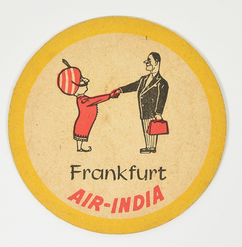 A coaster of a mustachiod figure wearing a turban shaking the hand of a person from Frankfurt.