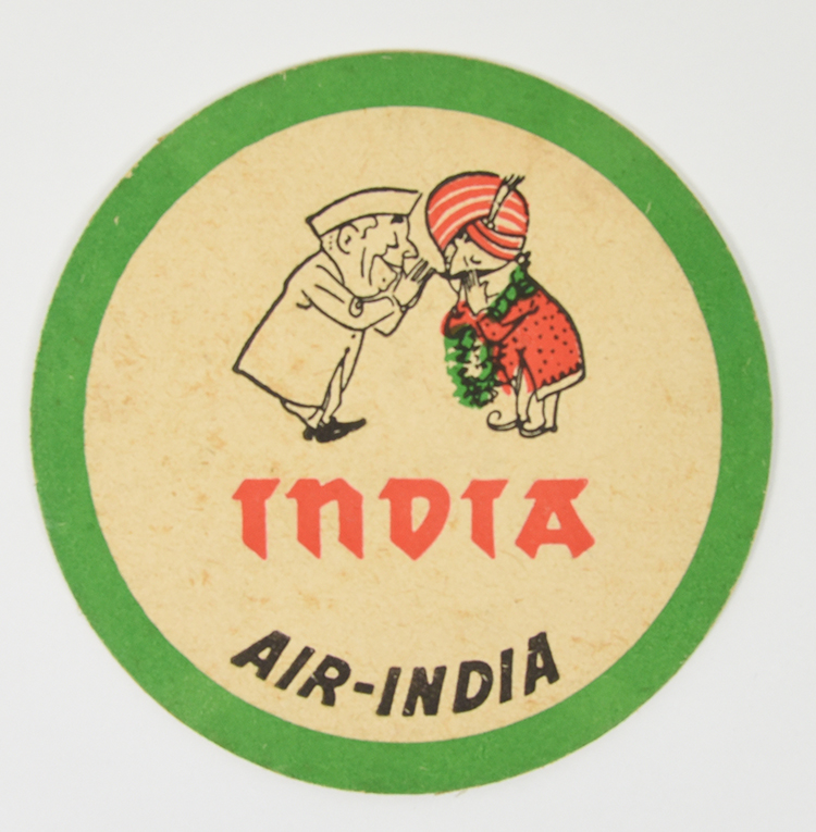 A coaster of a mustachiod figure wearing a turban whispering with another person from India.
