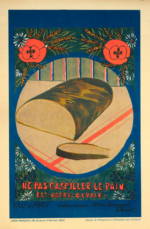 A lithographic poster of a loaf of bread cut on a table, surrounded by floral imagery.