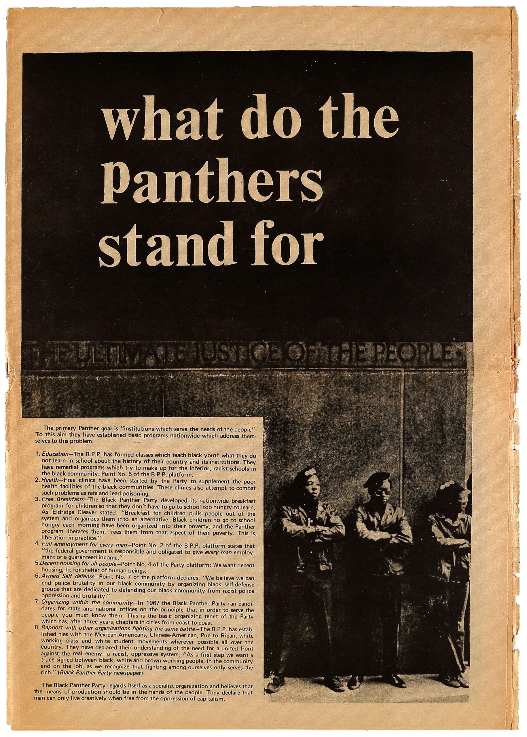 A newspaper page of Black Panther memebers standing with their arms crossed with text around them.